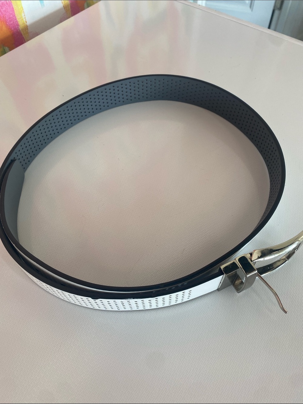 White Golf Perforated Belt with Silver Buckle. Size 36. Really good condition.
